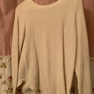 Sweater that buttons up the back.